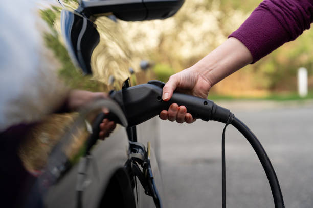 Electric vehicle plugged into a fast home EV charger